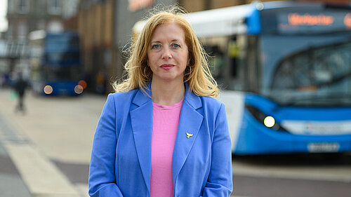 Liz Jarvis with bus in Eastleigh