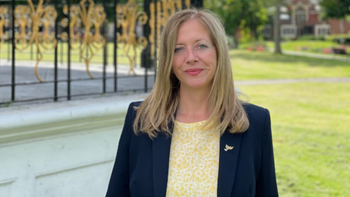 Liz Jarvis next to Eastleigh Bandstand